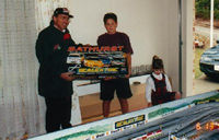 Larry Perkins presenting scalextric set